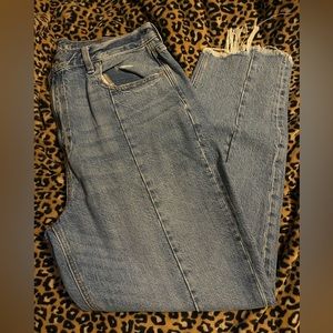 American Eagle size 14 mom jeans. With distressed bottoms. Used once.